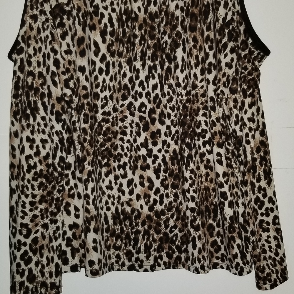 Shoulder baring animal print top